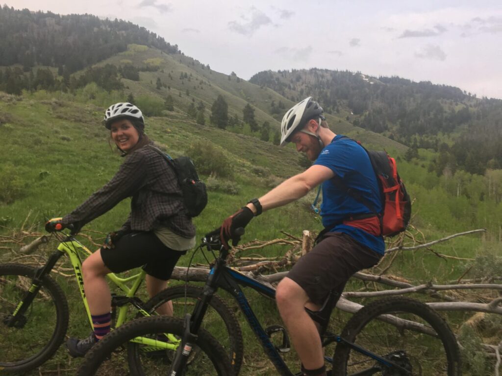 two mountain bikers stop for a break on cache creek
