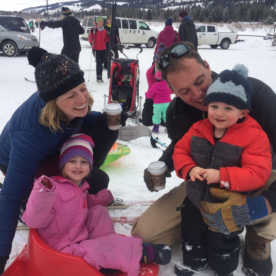 Young family enjoying free annual ski day at Turpin Meadow Ranch
