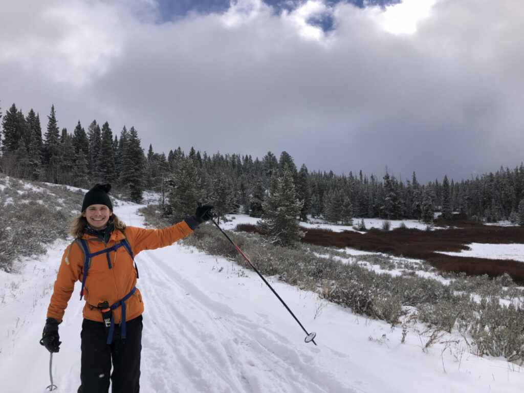 Male Gen Z Nordic skier smiling on the Nordic trail