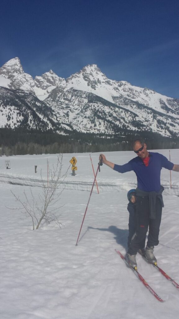 Jim Roscoe cross country skiing in front of the Tetons.