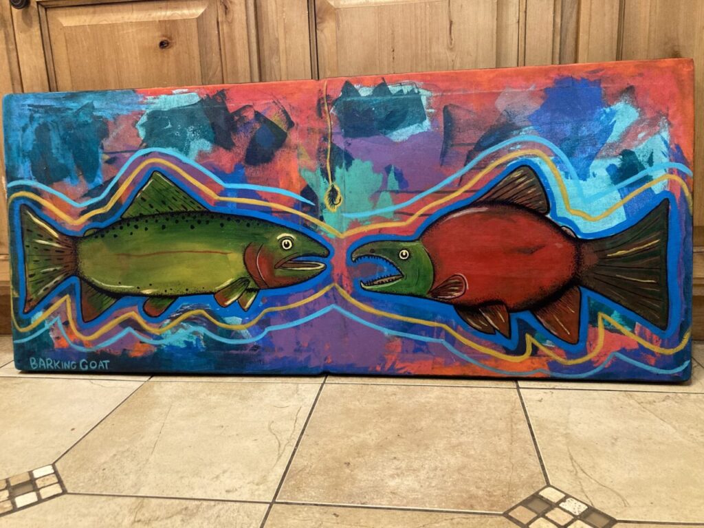 A large colorful painting of native Idaho fish by Stacey Barker. 