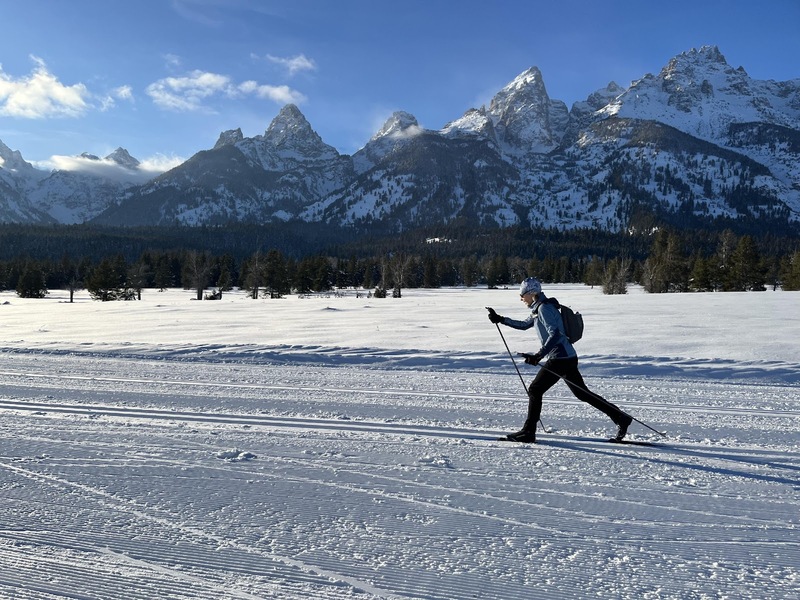 JH Nordic Beginner's Guide to Cross Country Skiing Part 1: Where to Start. Cross country skiier with the Tetons in the background