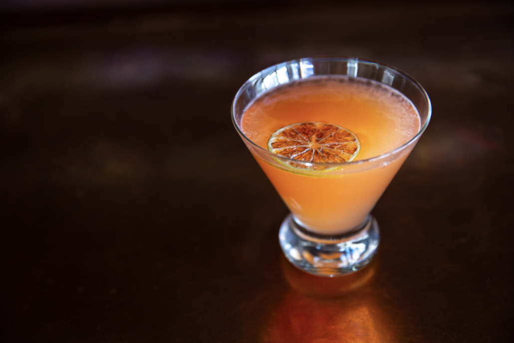 A pretty drink on the bar at Orsetto Italian Eatery