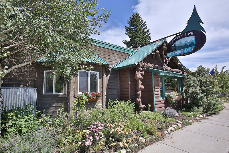 The Knotty Pine Supper Club cabin from the outside in the summer time