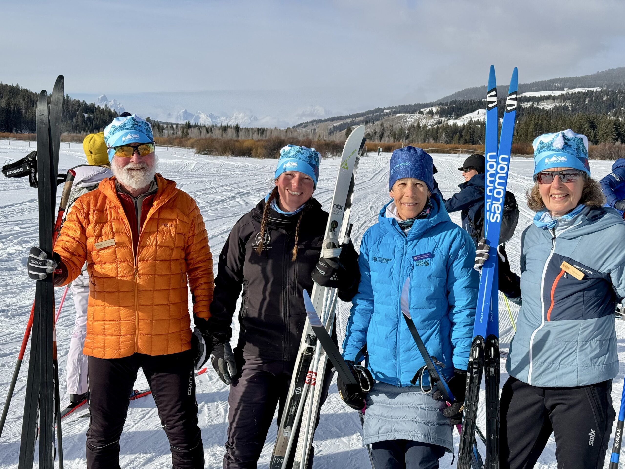 Four Nordic skiers ready to help people learn to ski