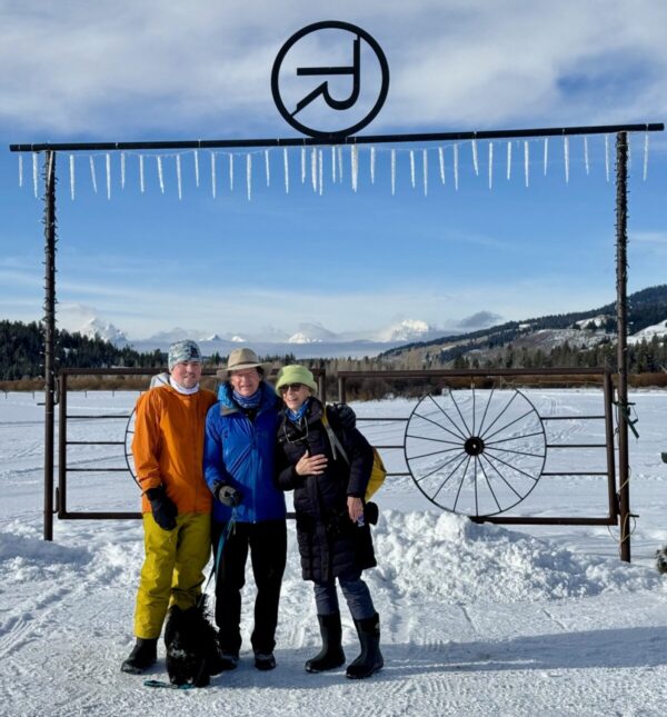 photo of Hardie family in front of Turpin Meadow Ranch outside in winter