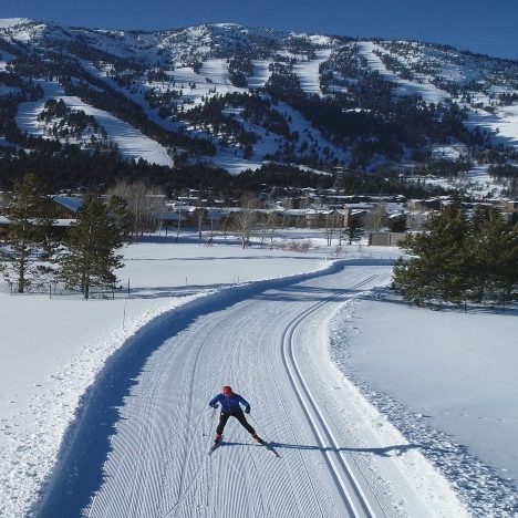 photo of skate skier at shooting star nordic with jackson hole mountain resort in background