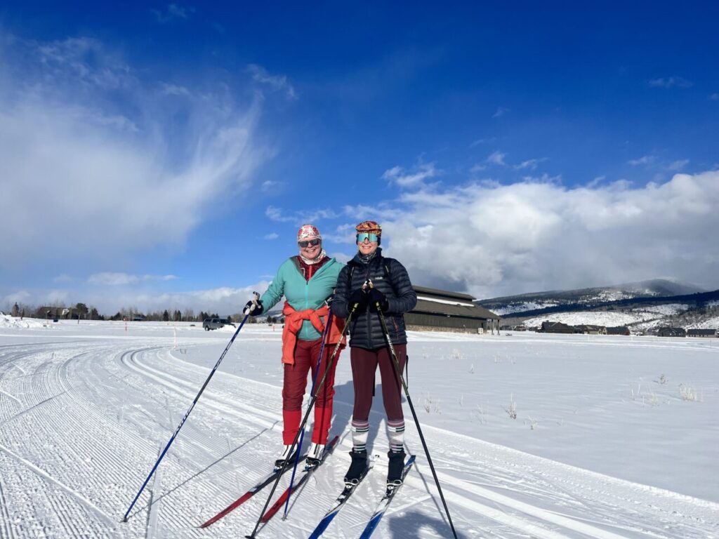Two happy skiers on a bluebird day. Teton Reserve Nordic.