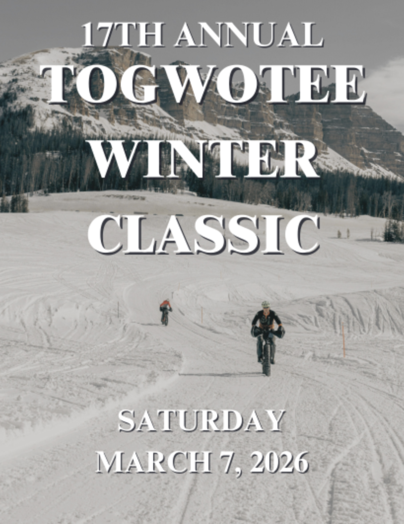 a pair of fat bikers riding on the groomed trails on togwotee pass